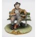 Capodimonte Tramp on Bench by B.Merli