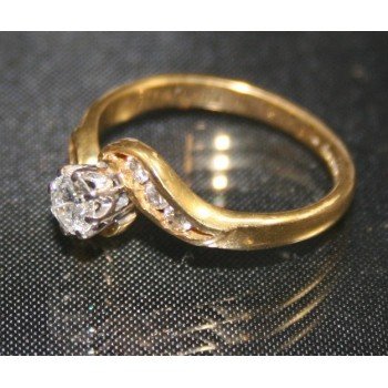 Diamond Single Stone Crossover Twist Yellow Gold Ring