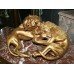 Gilded Sculpture of Lions Fighting
