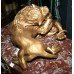 Gilded Sculpture of Lions Fighting