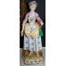 Pair of Meissen Style Porcelain Flower Seller Figures