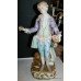 Pair of Meissen Style Porcelain Flower Seller Figures