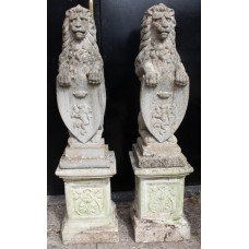 Pair of Old Reconstituted Lion Statues on Plinths