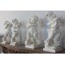 Set of Four Baroque Style Marble Cherub Musicians